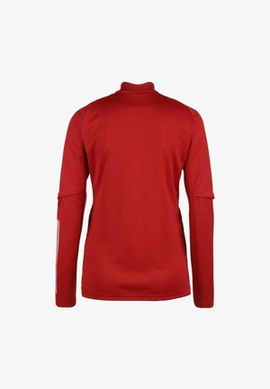 Red long-sleeve sports jersey featuring a high collar, textured shoulder panels, and white accent stripes on the sleeves. Smooth fabric finish.