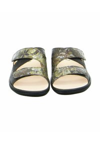 Brown sandals with two adjustable straps, textured upper featuring a floral pattern in green and yellow, and a smooth beige footbed.