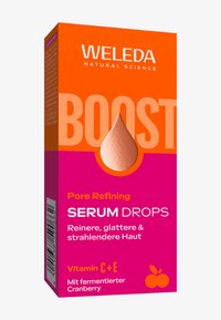Weleda Pore Refining Serum Drops æske, orange og pink design, tekstureret dråbeaccent, med detaljer om vitamin C og E, tranebær grafik.