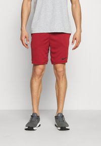 Nike Performance Pantalón corto de deporte - dark red