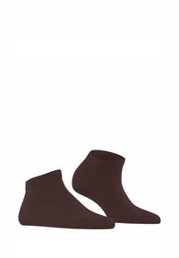 Brązowe skarpetki do kostek wykonane z miękkiego, elastycznego materiału, z prążkowanym wykończeniem i gładką teksturą. Posiadają minimalne logo na pięcie.