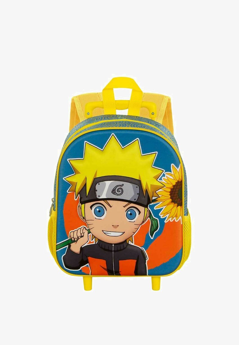 Mochila amarilla con un diseño de caricatura de un personaje con cabello rubio puntiagudo, ojos azules y un fondo de girasoles. Superficie texturizada.