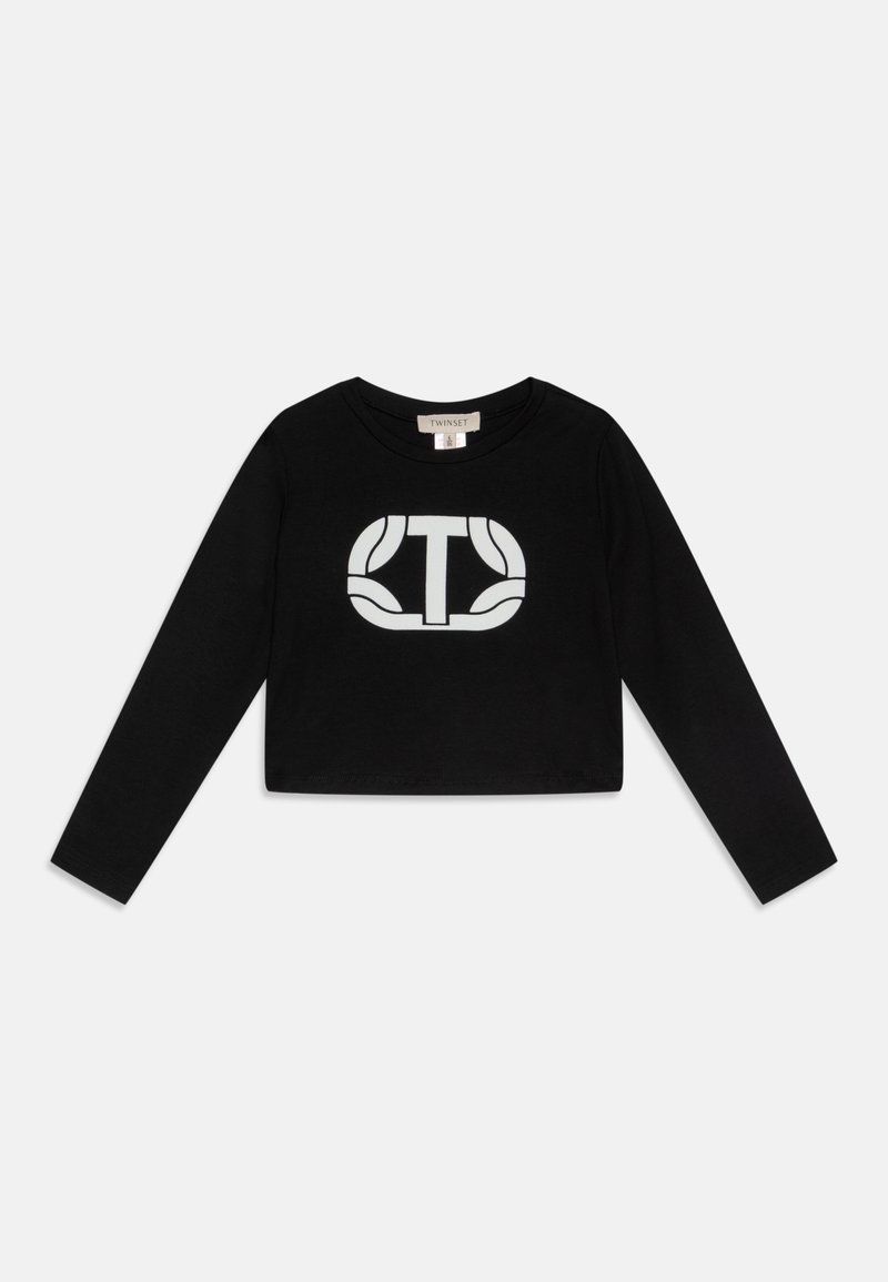 Schwarzes langärmliges, cropped T-Shirt aus weichem Material mit einem großen weißen Logo-Design auf der Vorderseite. Schlichter Rundhalsausschnitt und enge Ärmel.