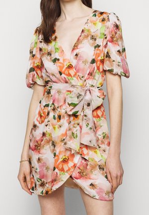 Short floral dress with a deep V-neckline, puffed sleeves, and a tie belt. Features a blend of orange, pink, and green hues on a light background.