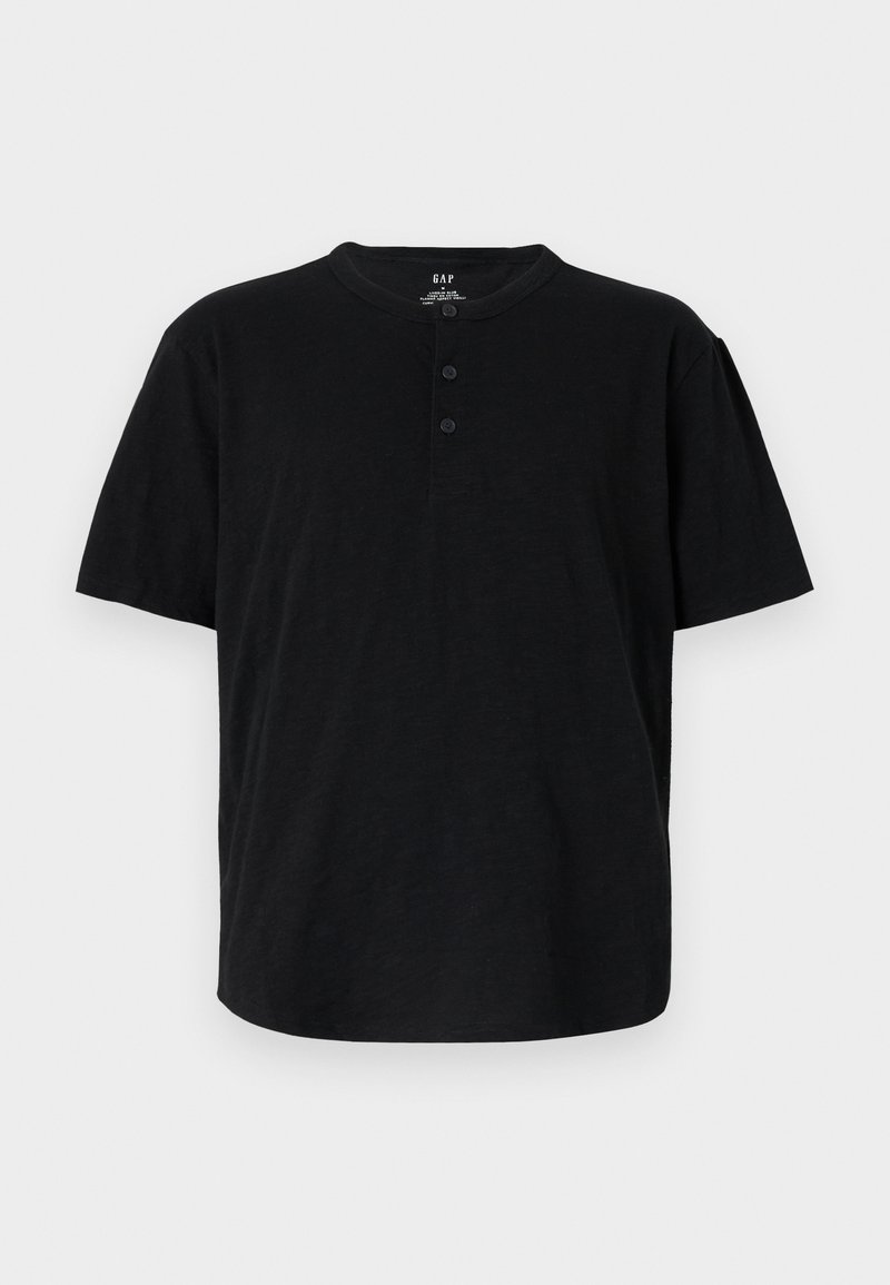 Schwarzes T-Shirt mit kurzen Ärmeln, Rundhalsausschnitt, drei Knöpfen und entspannter Passform. Hergestellt aus einem weichen, strukturierten Stoff.