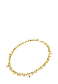 Collana di gemme gialle con forme e dimensioni variabili, caratterizzata da una miscela di pietre sfaccettate e levigate in tonalità di giallo e arancione.