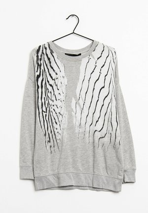 Szary sweatshirt z czarno-białym abstrakcyjnym wzorem pasków na przodzie, z okrągłym dekoltem i ściągaczami przy mankietach oraz u dołu.