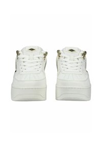 Pair of white platform sneakers with lace-up closure and gold detail on tongue and sides, viewed from the front.