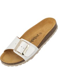 White slide sandal with a textured strap and a silver buckle. Cork footbed with a brown leather-like finish. Light, cushioned sole.