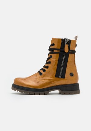 Bottines à plateau - mustard yellow