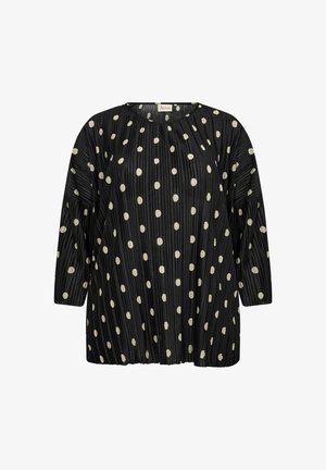 Črna plisirana bluzica s tremi četrtinskimi rokavi, okrašena z belimi pikami. Okrogla izrezana in ohlapna zasnova. Mehka tekstura.