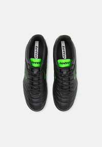 Lotto STADIO 705 TF UNISEX - Chaussures de football sur gazon - all black/spring green