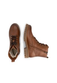 Bruine leren enkellaarzen met een ronde neus, zwarte veters, een zijrits en een gemodelleerde rubberen zool. Zachte voering zichtbaar aan de binnenkant.