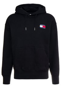 Felpa nera in cotone con tasca frontale. Presenta un cappuccio con cordino marrone, polsini a costine e un piccolo logo multicolore di Tommy Jeans.
