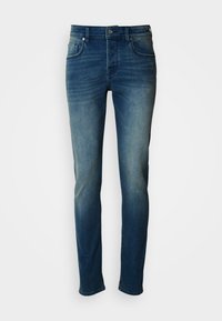 Τζιν παντελόνια από μέτριο μπλε ύφασμα, με εφαρμοστή γραμμή, ίσια μπατζάκια, σχεδιασμό με πέντε τσέπες και διακριτική ξεθώριαση στους μηρούς και τα γόνατα.