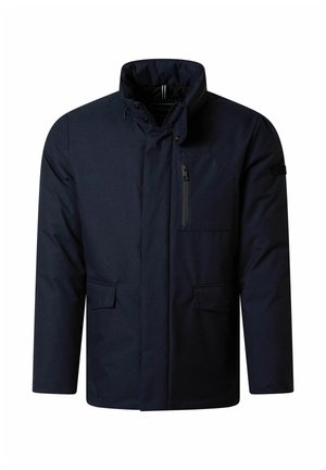 Marineblauwe gewatteerde jas met een hoge kraag, een ritszak en twee voorzakken met kleppen. De stof heeft een gladde, matte afwerking.