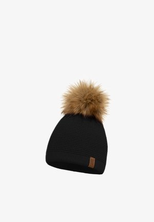 Bonnet en tricot noir avec un motif texturé et un pompon en fausse fourrure marron sur le dessus. Présente une petite étiquette en cuir marron à la base.