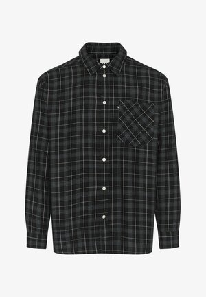 Cămașă cu carouri negre din bumbac, cu mâneci lungi, guler cu nasturi și un singur buzunar pe piept cu cusături albe în contrast.