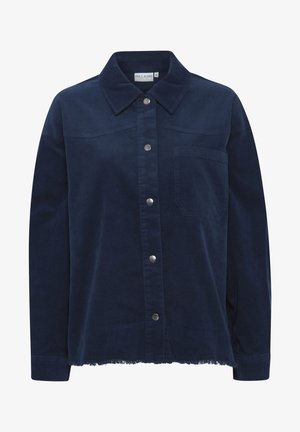 Giacca camicia di velluto a coste blu navy con colletto, bottoni a pressione e una tasca sul petto. Presenta un orlo sfrangiato e un tessuto testurizzato.