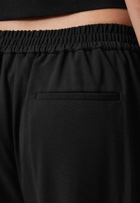 AllSaints ALEIDA - Stoffhose - black