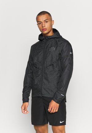 RUN FLASH - Giacca da running - black/reflective silver