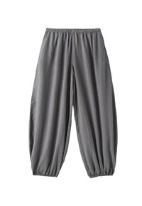 Pantalon gris ample avec taille élastique et poignets aux chevilles, présentant un tissu à motif à carreaux texturé.