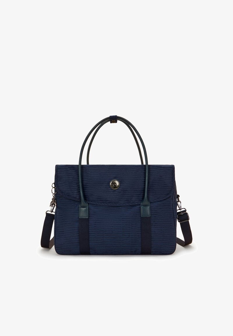 Navy fabric tote bag with textured surface, dual top handles, detachable shoulder strap, magnetic closure, and metal logo accent.