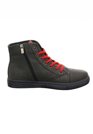 High-top sneaker in dark green leather with red laces, side zipper, black sole, and metal accents. Smooth texture and modern design.