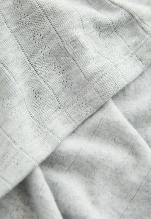 Light gray knit fabric featuring a texture of fine stripes and small holes, with a smooth backing and no visible hardware.