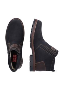 Czarne skórzane botki za kostkę z brązowymi akcentami, z bocznym zamkiem, teksturowana powierzchnia, gumowa podeszwa z głębokim bieżnikiem, wyściełane wnętrze dla komfortu.