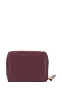 Burgundy leather wallet with a textured finish, gold zip closure, and a small leather pull tab. Compact rectangular design.