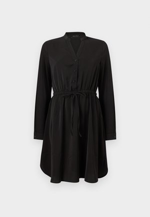 Musta pitkähihaisen paita-mekko mandariinikauluksella, napitettu etuosa, säädettävä vyötärönauha ja kaartuva helma.