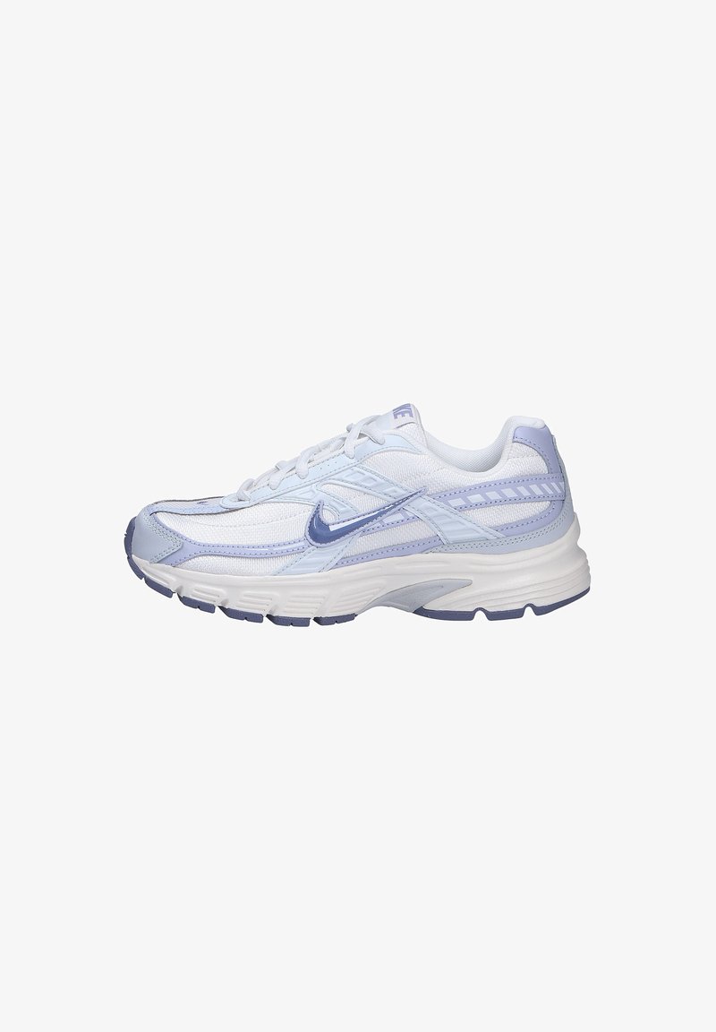 White and light purple Nike running shoe with laces, cushioned sole, and textured grip, shown from the side on a white background.