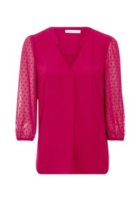 Blusa fucsia con mangas cortas de tul con lunares, escote en V y corte relajado; textura suave con detalles fruncidos en los puños de las mangas.