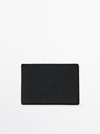 Black leather wallet with a textured surface, rectangular shape, and rounded corners. No visible hardware or branding elements.