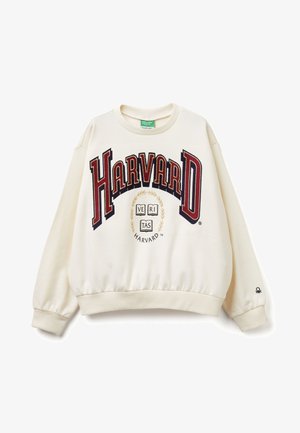 Felpa crema con la scritta "HARVARD" in rosso scuro e blu navy con accenti bianchi. Polsini e orlo elasticizzati, grafica centrale con design di alloro.