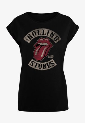 Schwarzes Baumwoll-T-Shirt mit rundem Halsausschnitt. Mit einem Grafikdesign eines roten Zungen und dem Schriftzug "THE ROLLING STONES" im Vintage-Stil.