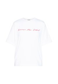 White cotton t-shirt with short sleeves and relaxed fit. Features red cursive text reading "Senses. The Label" across the chest.