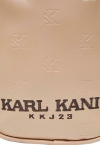 Karl Kani BAG - Cross body bag - sand