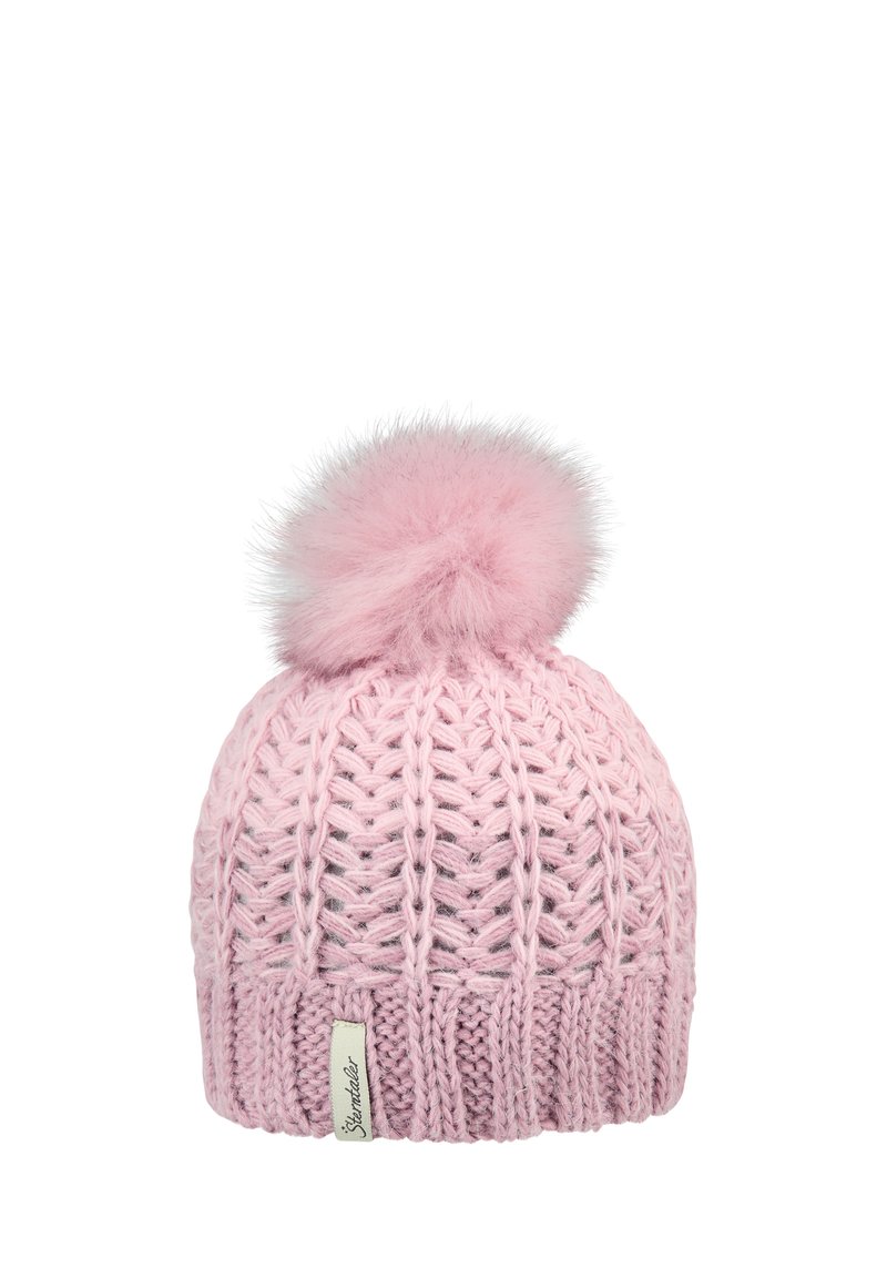 Pink knitted winter hat with ribbed pattern and large fluffy pom-pom on top, featuring a small fabric brand label.