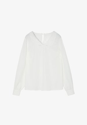 Valge pika varrukaga pluus V-kaelusega, millel on spetsiifiline pitsikiri ja lukuauk seljal. Sile kangas, lõdva lõikega.