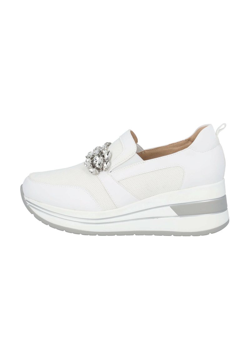 White sneaker with a mesh and synthetic upper, decorative silver embellishment, elastic band, and a cushioned wedge sole.