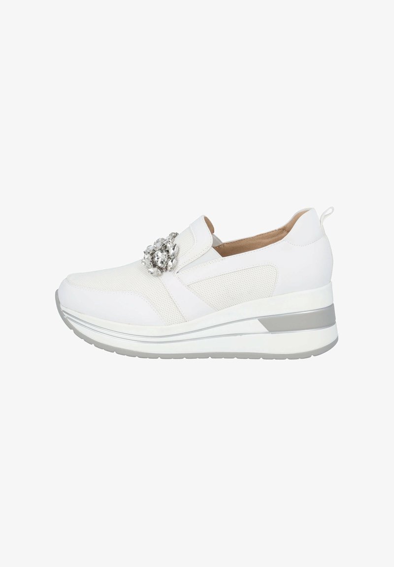 White sneaker with a mesh and synthetic upper, decorative silver embellishment, elastic band, and a cushioned wedge sole.