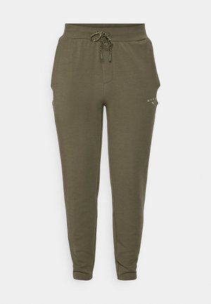 Pantalones de chándal verde oliva con cinturilla elástica y cordón ajustable, que presentan un corte slim y un logotipo sutil cerca del bolsillo.