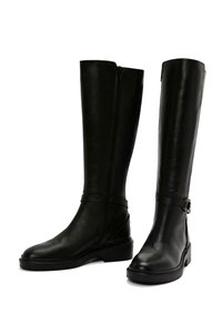Knee-high black leather boots with a zip closure, flat soles, and a side buckle accent. Smooth texture and tall, straight design.