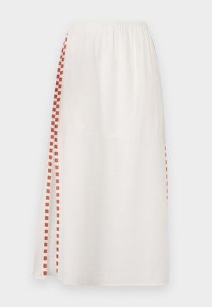Biela sukňa s elastickým pásom, so červeným kockovaným vzorom na jednej strane. Ľahký materiál s hladkou textúrou.