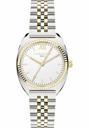 Heren polshorloge met zilveren en gouden tweekleurige analoge wijzerplaat, witte wijzerplaat, gouden uurmarkeringen en gouden Romeins cijfer XII boven in het midden.