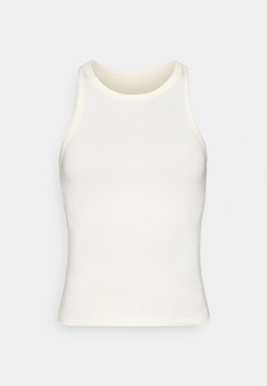 Άσπλο αμάνικο τοπ από λεία ύφανση, με στρογγυλή λαιμόκοψη και εφαρμοστή γραμμή, με καθαρό τελείωμα. Απλός και λιτός σχεδιασμός.