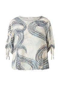 Blouse légère et ample de couleur crème avec des motifs abstraits bleus et gris. Caractérisée par des manches courtes avec des nœuds et un col rond.