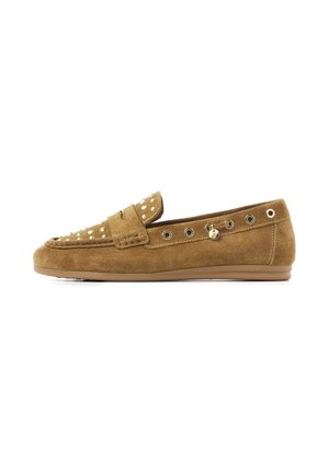 Brown suede loafer with gold-tone studs on top and eyelets along the side, featuring a flat rubber sole.